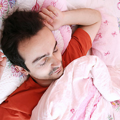 Image showing Young man sleeping .