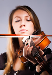 Image showing Woman playing on violin