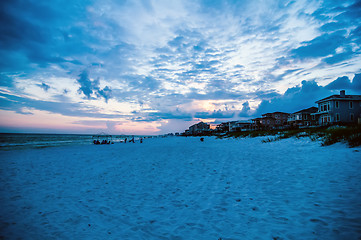 Image showing sunset on florida beach with white sand and blue sky