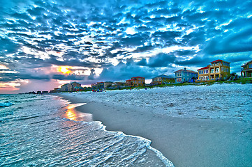 Image showing sunset on florida beach with white sand and blue sky