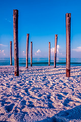 Image showing old sea pier ruins on the beach