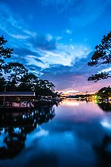 Image showing A Very Colorful Mythical Sunset Over water way near ocean