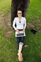 Image showing woman with laptop in park