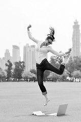 Image showing woman with laptop in park