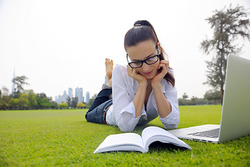 Image showing woman with laptop in park