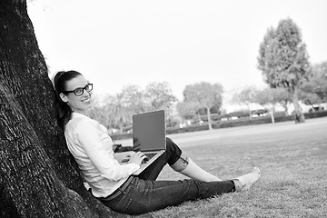 Image showing woman with laptop in park