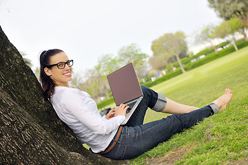 Image showing woman with laptop in park