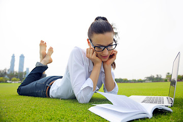 Image showing woman with laptop in park