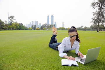 Image showing woman with laptop in park