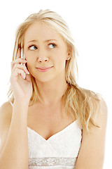 Image showing surprised teenage girl with a phone