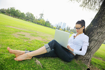 Image showing woman with laptop in park