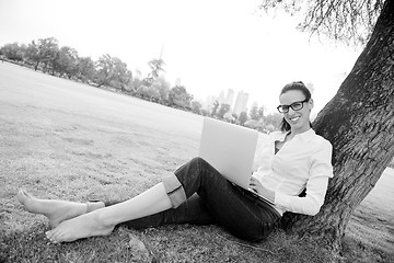 Image showing woman with laptop in park