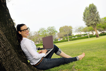 Image showing woman with laptop in park