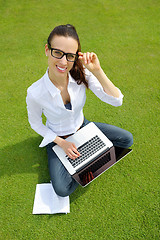 Image showing woman with laptop in park