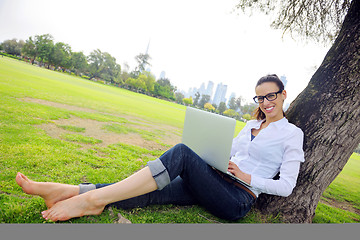 Image showing woman with laptop in park