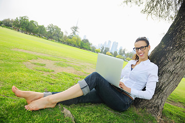 Image showing woman with laptop in park