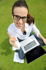 Image showing woman with laptop in park