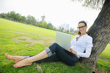 Image showing woman with laptop in park