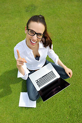 Image showing woman with laptop in park