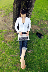 Image showing woman with laptop in park