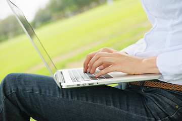 Image showing woman with laptop in park