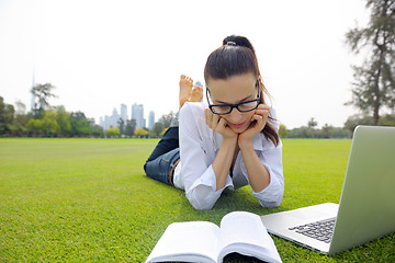 Image showing woman with laptop in park