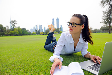 Image showing woman with laptop in park