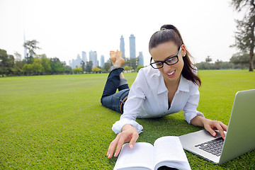 Image showing woman with laptop in park