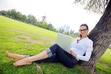 Image showing woman with laptop in park