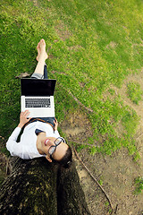 Image showing woman with laptop in park