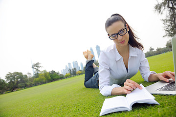 Image showing woman with laptop in park