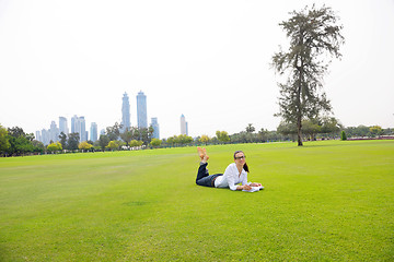 Image showing woman with laptop in park