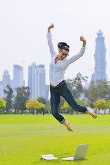 Image showing woman with laptop in park