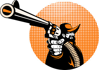 Image showing bandit cowboy pointing a revolver hand gun