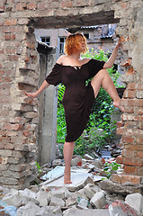 Image showing grunge portrait of a  woman in urban ruins