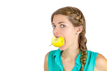 Image showing Girl taking a bite of an apple.