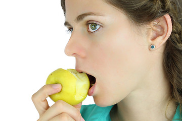 Image showing Girl taking a bite of an apple.