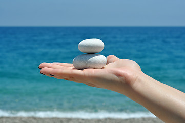 Image showing Zen stones hand