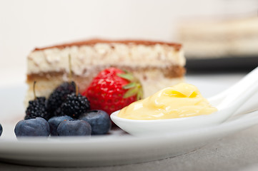 Image showing tiramisu dessert with berries and cream