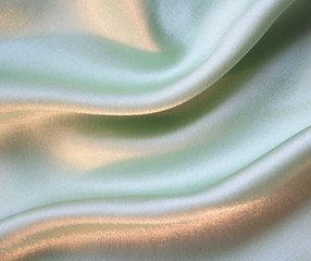 Image showing Smooth elegant green silk as background