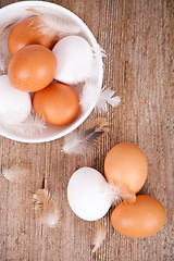 Image showing brown and white eggs in a bowl