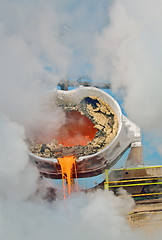 Image showing hot steel pouring
