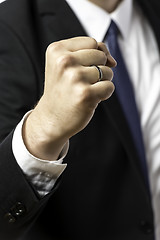 Image showing Businessman holding up his fist