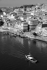 Image showing Portugal. Porto city. View of Douro river embankment  in black a