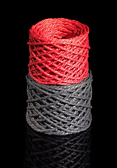 Image showing grey and red twine