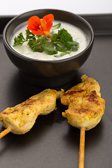Image showing Chicken skewers and bowl