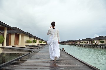 Image showing young woman relax on cloudy summer day