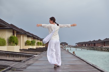 Image showing young woman relax on cloudy summer day