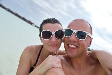 Image showing happy young  couple at summer vacation have fun and relax at bea