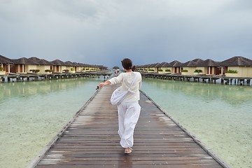 Image showing young woman relax on cloudy summer day